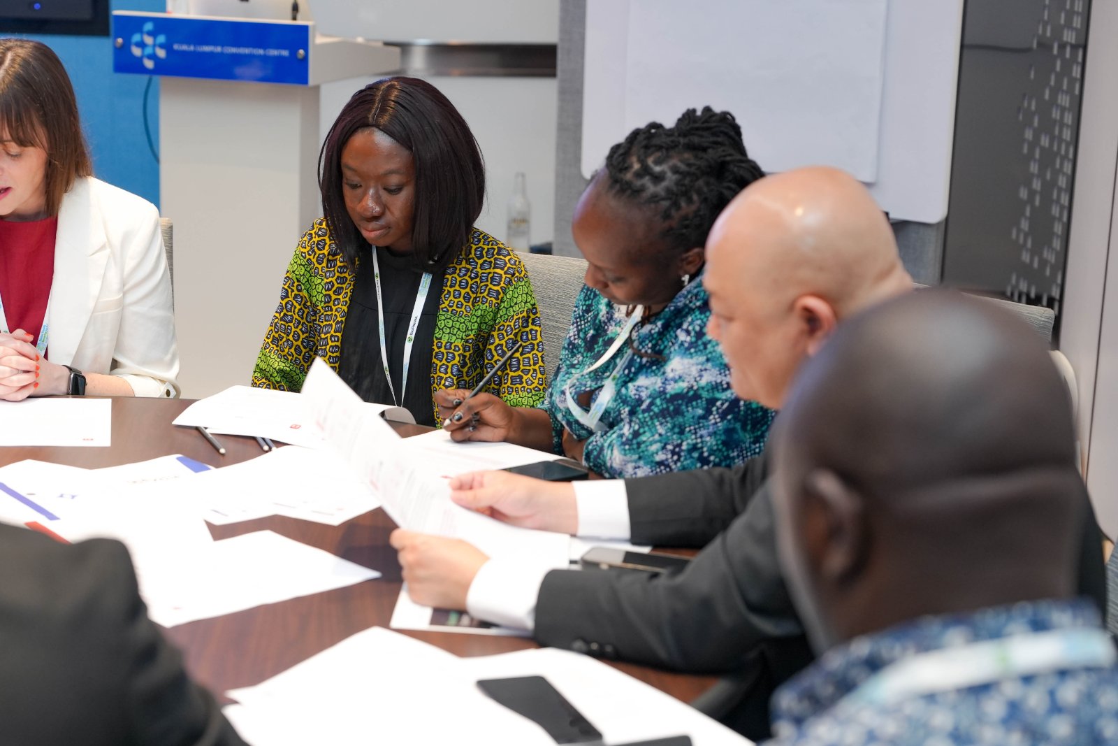 A tabletop exercise in progress, technical and policy cells at work