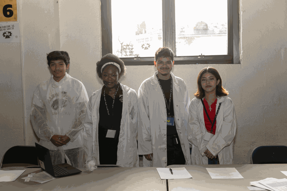A student team presenting as biomedical researchers