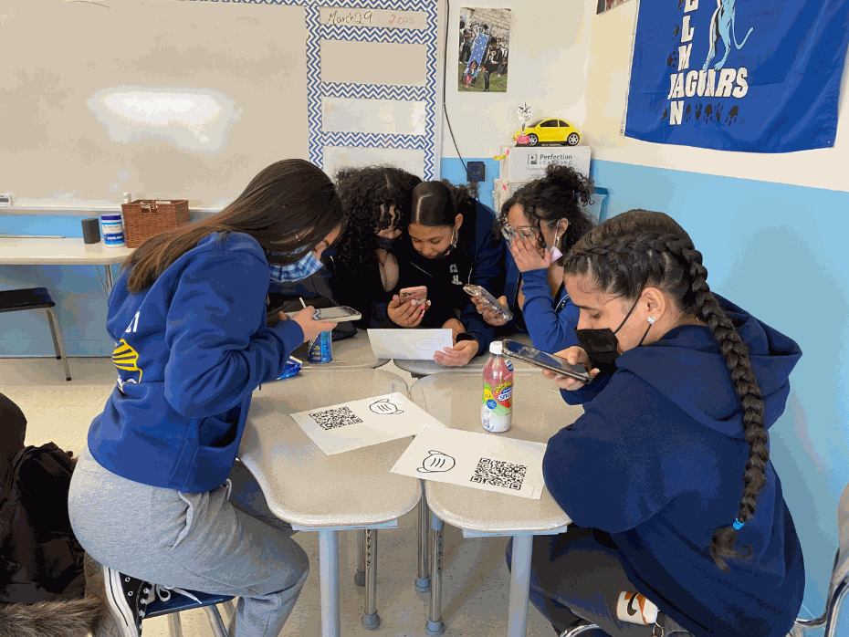 Students working a simulation together