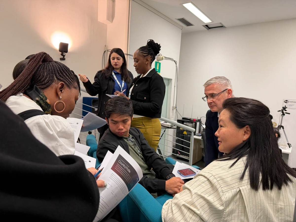 Participants working an outbreak scenario during biosecurity training in Trieste, Italy